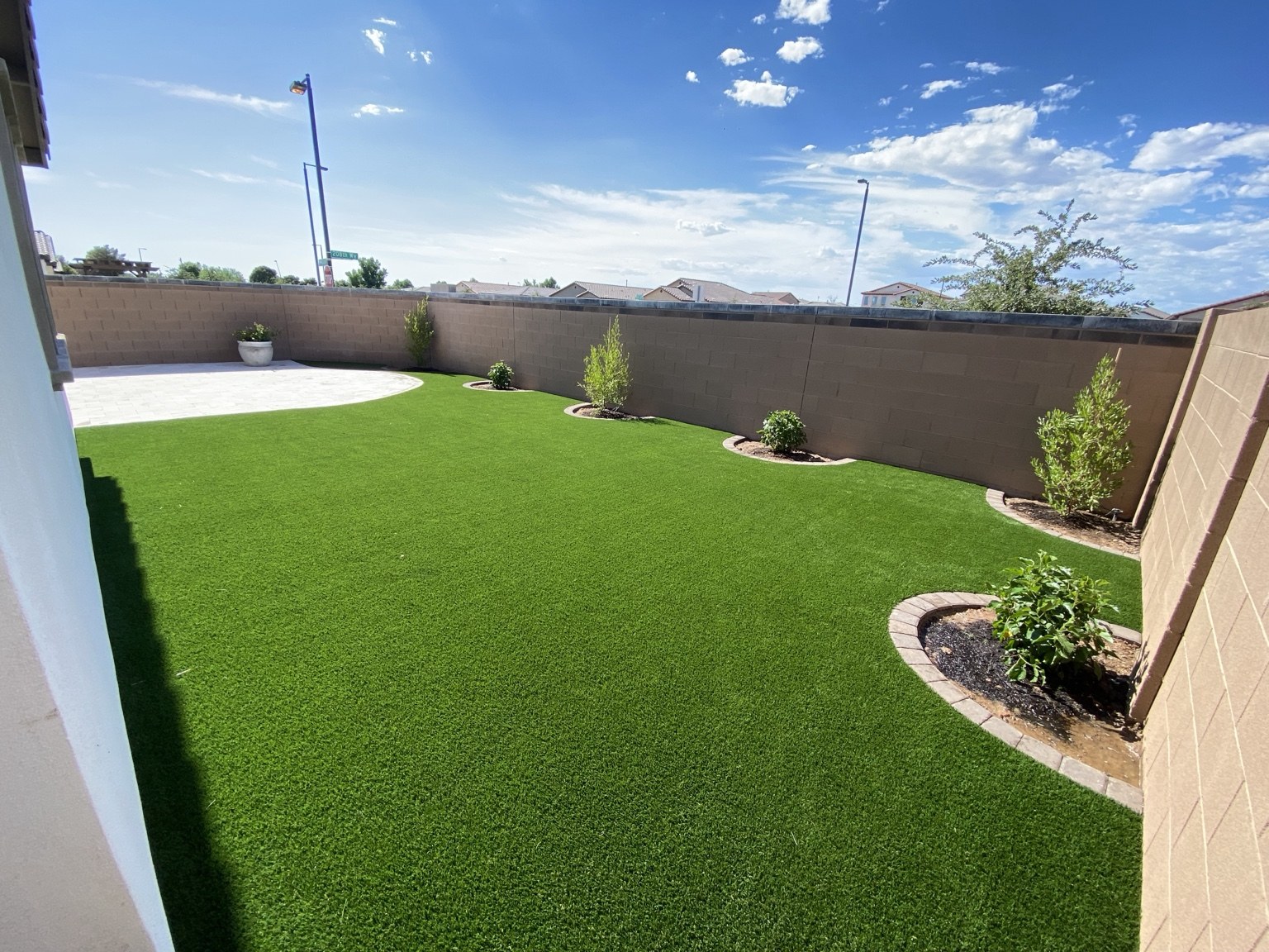 Completed backyard artificial turf installation